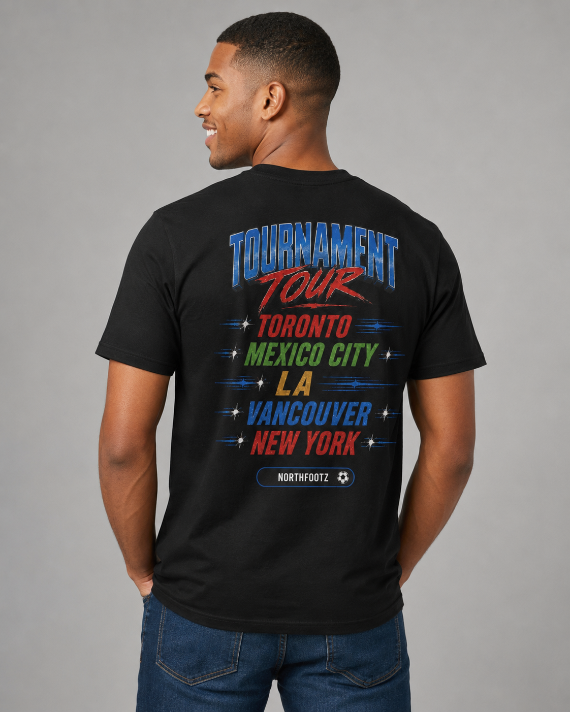 FWC 26 World Cup Game Day Tee — Kicking Football Cartoon with Host Cities & Flags
